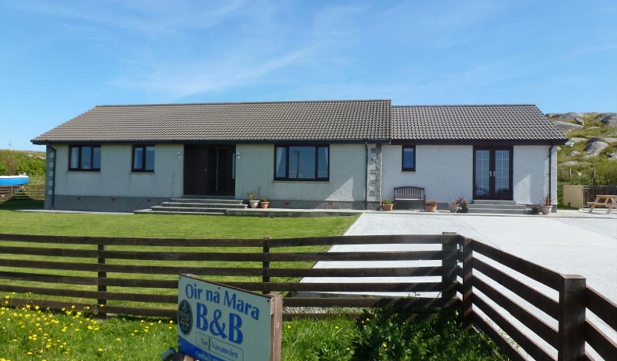 Oir Na Mara house & blue sky