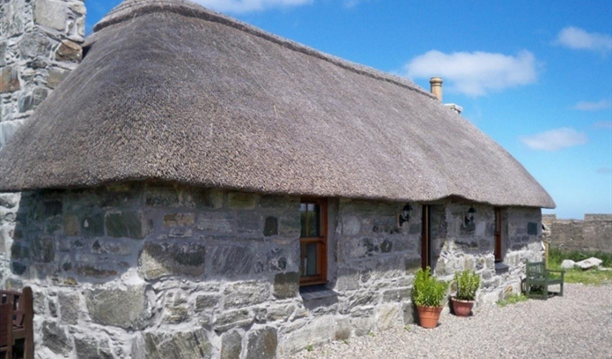 Taigh Neill stone house with thatch