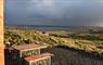 The View Isle of Lewis Lodges patio seating with a view