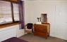 Lily Pond Cottage chair & sideboard in bedroom