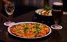 Harris Hotel Pizza and loaded nachos with beer and wine