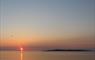Na Bothain, Sandy Bay Wigwams ® sunset on sea