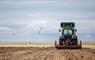 Long Island Retreats tractor ploughing in field