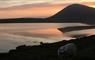 Puffin and Peregrine Tiny-House's sea & sheep at twilight